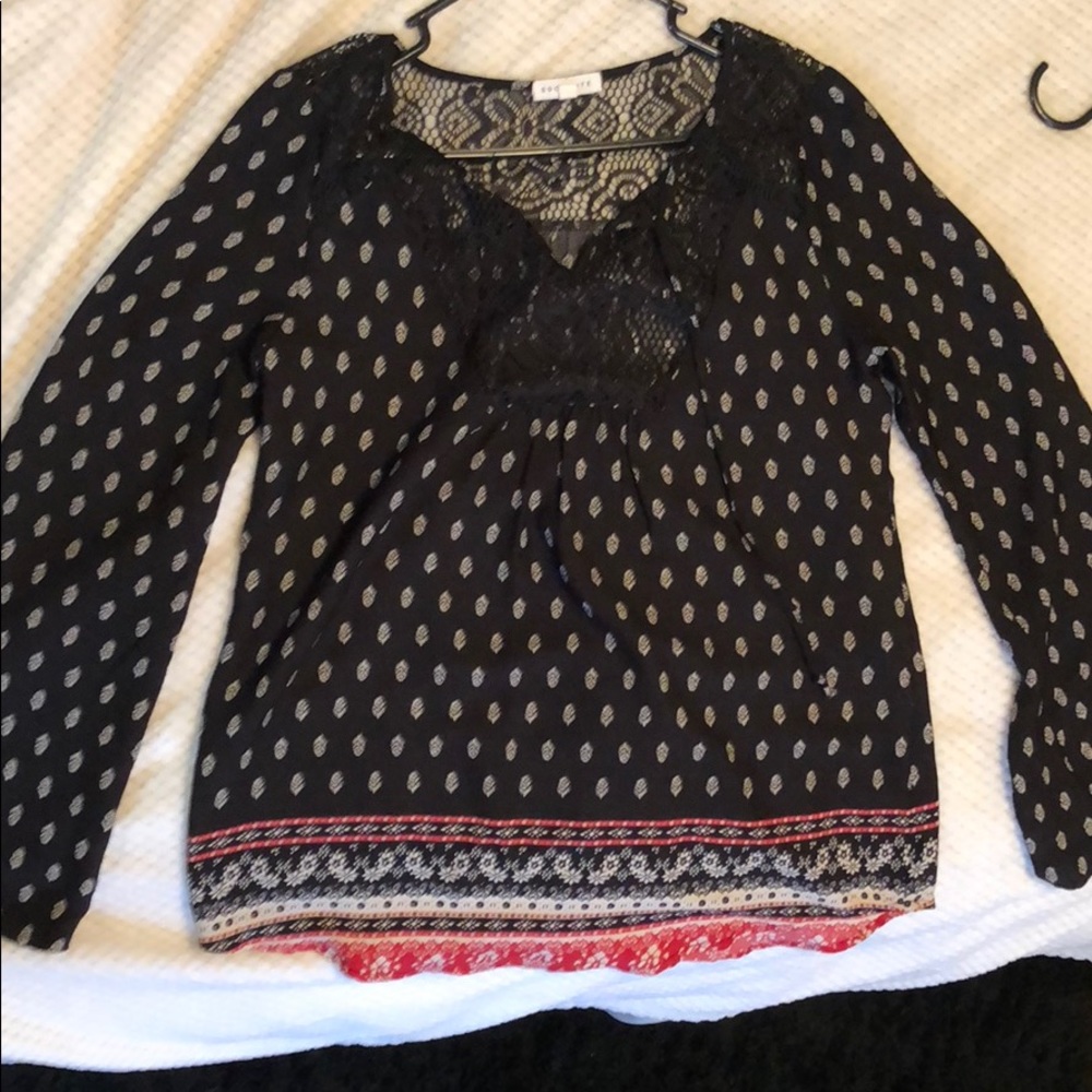Socialite blouse from Tillys black, red, and white